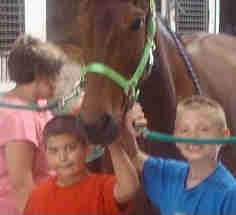 Standardbred Fan Club family members with Savannah a former race horse